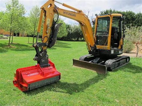 land clearing with mini excavator|mulch head for mini excavator.